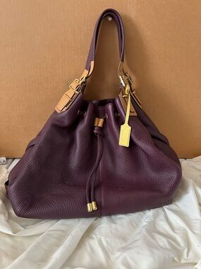 Luxurious Plum Leather Drawstring Shoulder Bag by Coach